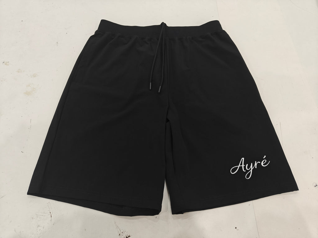 Front view of black 'Mastered Together' shorts