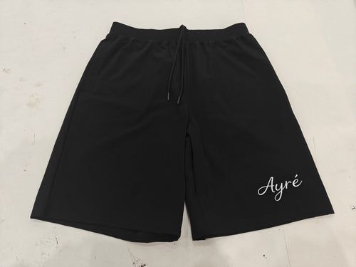 Front view of black 'Mastered Together' shorts